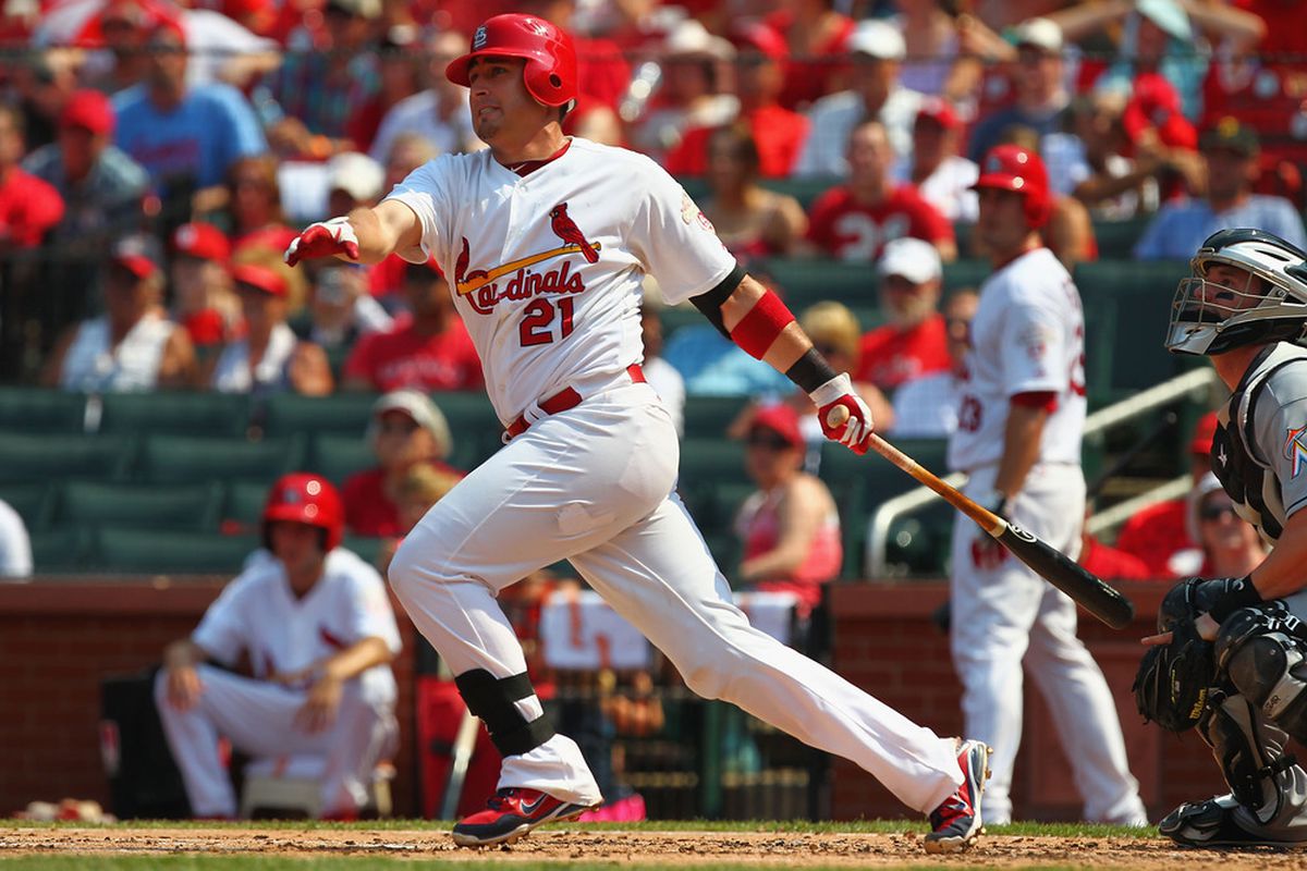 ST. LOUIS, MO - JULY 7: Allen Craig #21 of the St. Louis Cardinals hits a double against the Miami Marlins at Busch Stadium on July 7, 2012 in St. Louis, Missouri.  (Photo by Dilip Vishwanat/Getty Images)