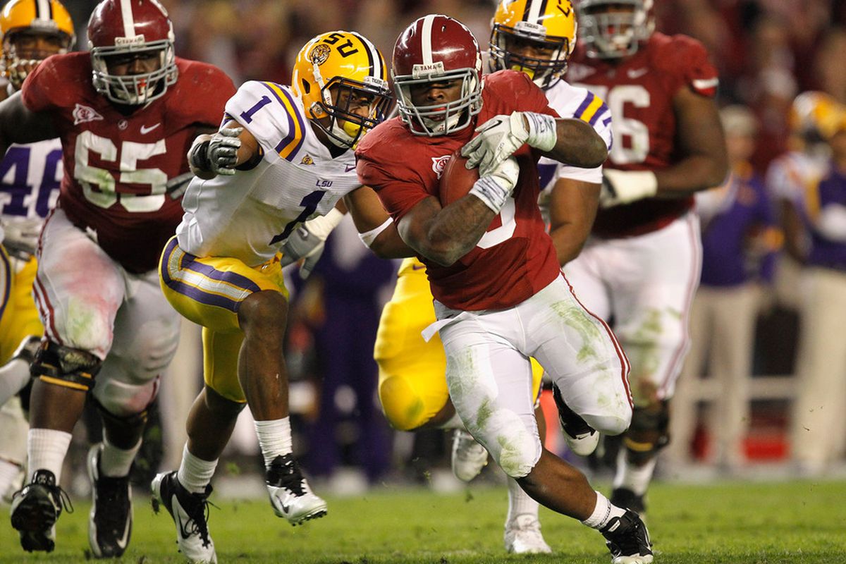 TUSCALOOSA, AL - NOVEMBER 05:  Trent Richardson #3 of the Alabama Crimson Tide is tackled by Eric Reid #1 of the LSU Tigers during their game at Bryant-Denny Stadium on November 5, 2011 in Tuscaloosa, Alabama.  (Photo by Streeter Lecka/Getty Images)