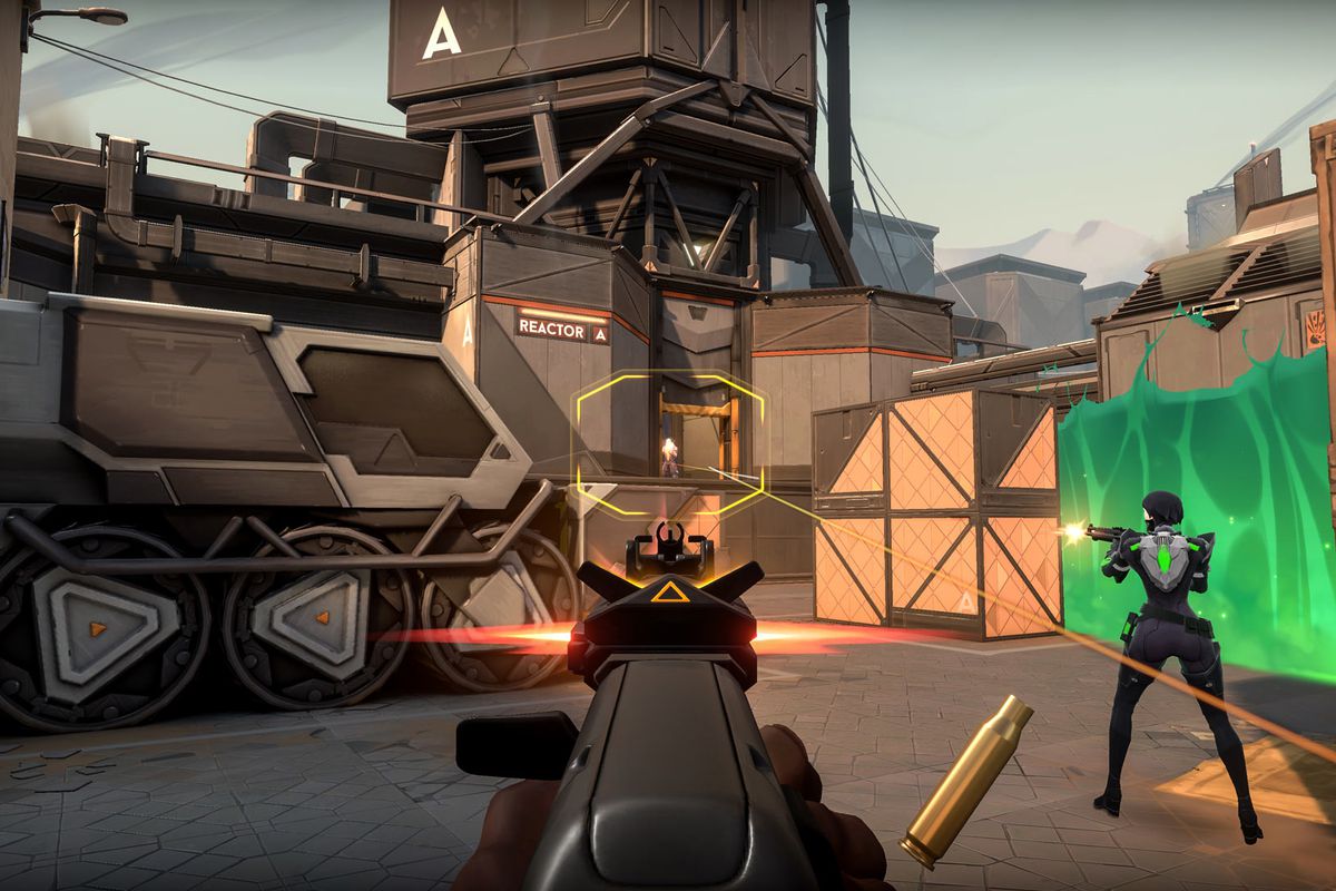 A player in Valorant aims down the sights of their gun at another player