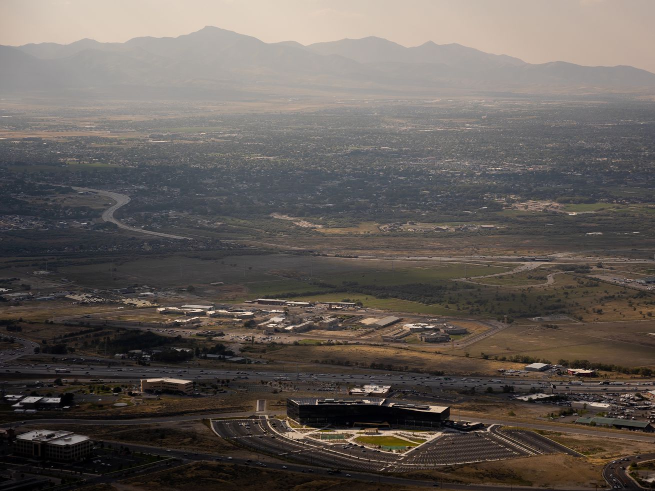 The Utah State Prison, the headquarters of tech company Pluralsight and I-15 in Draper are pictured on Wednesday, Aug. 25, 2021.
