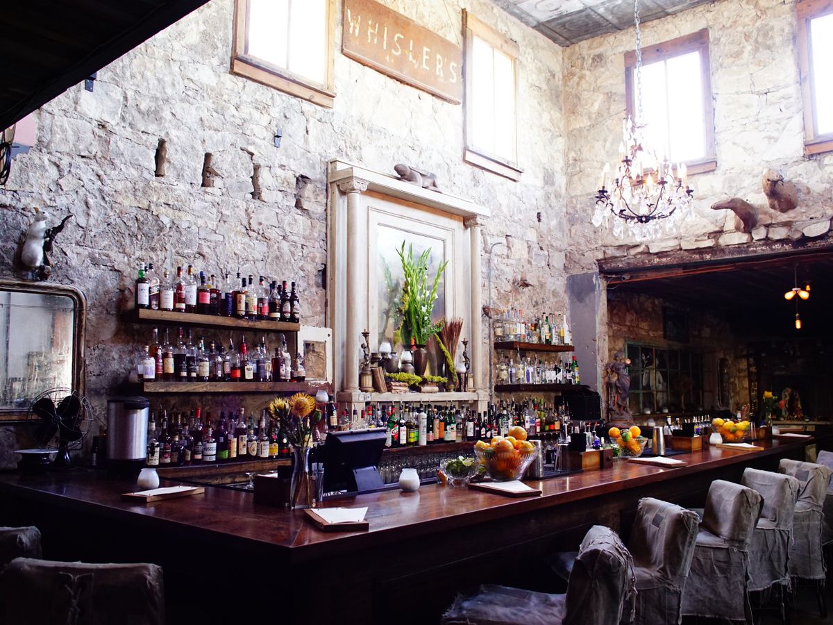 A bar with stone walls.