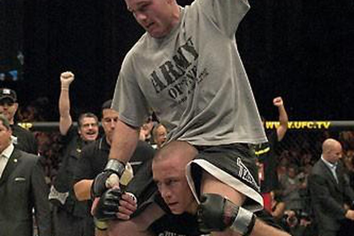 Matt Hughes sits on the shoulders of Georges St. Pierre after defeating him at UFC 50. <em>Photo by <a href="http://www.ufc.com/media/UFC-50-Event-Fight-Photos#i=87" target="new">UFC.com</a></em>