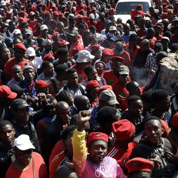Opposition party members protest in Pretoria, South Africa, Tuesday, Aug. 8, 2017, against President Jacob Zuma ahead of a parliament vote in Cape Town on a motion of no confidence in his leadership. The vote will be secret, which opposition parties hope will encourage disgruntled legislators from the ruling African National Congress party to vote against Zuma. (AP Photo/Themba Hadebe)