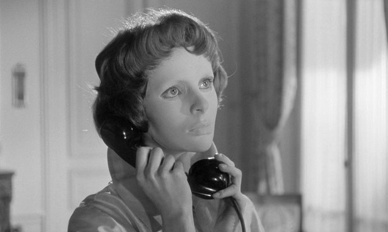 Edith Scob wears her mask and is on the phone in Eyes Without a Face.