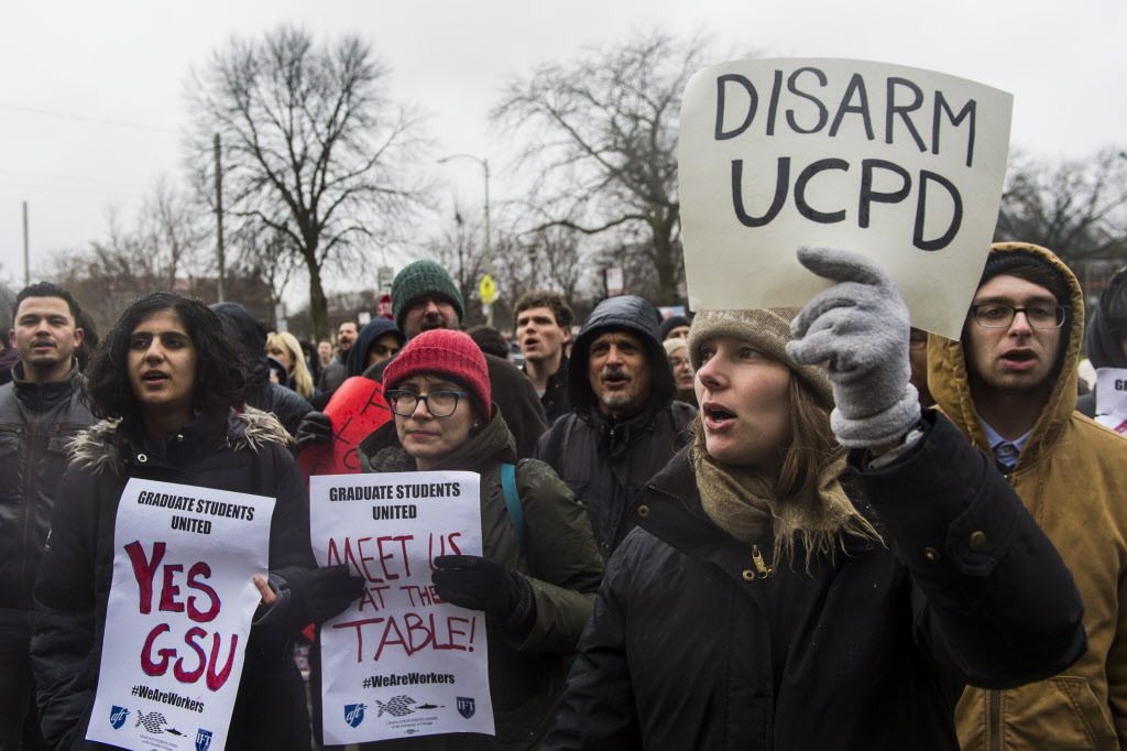 Graduate Students United and community activists chant outside International House where University of Chicago President Robert Zimmer spoke to undergraduate students, on Thursday, April 5, 2018, in Chicago. | Tyler LaRiviere/Sun-Times