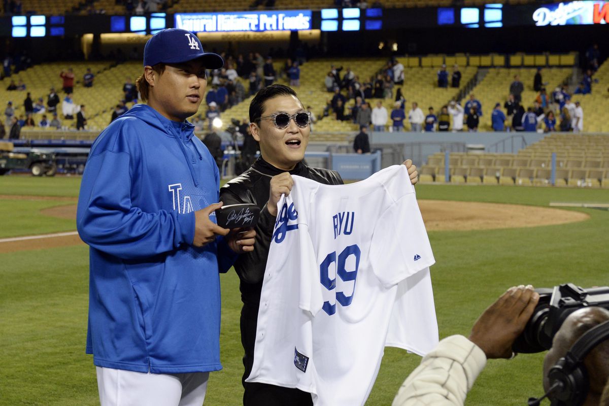 Apparently, Ryu gave is countryman Psy, of Gangnam Style fame, a jersey after the game. This photo was just too ridiculous not to use.