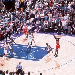 Chicago Bulls' Michael Jordan makes the winning shot during Game 6 of the NBA Finals against the Utah Jazz at the Delta Center in Salt Lake City, Utah, in this June 14, 1998 photo.