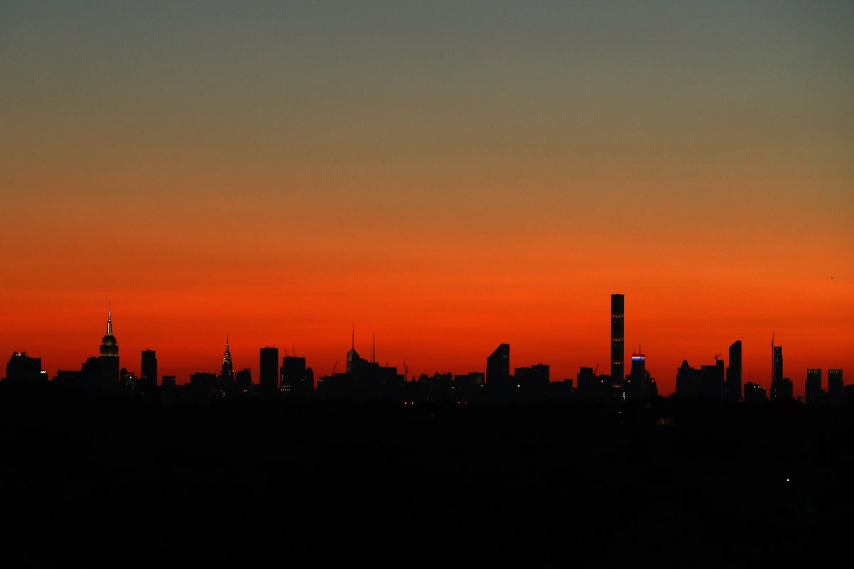 New York City skyline as seen from Queens at sunset