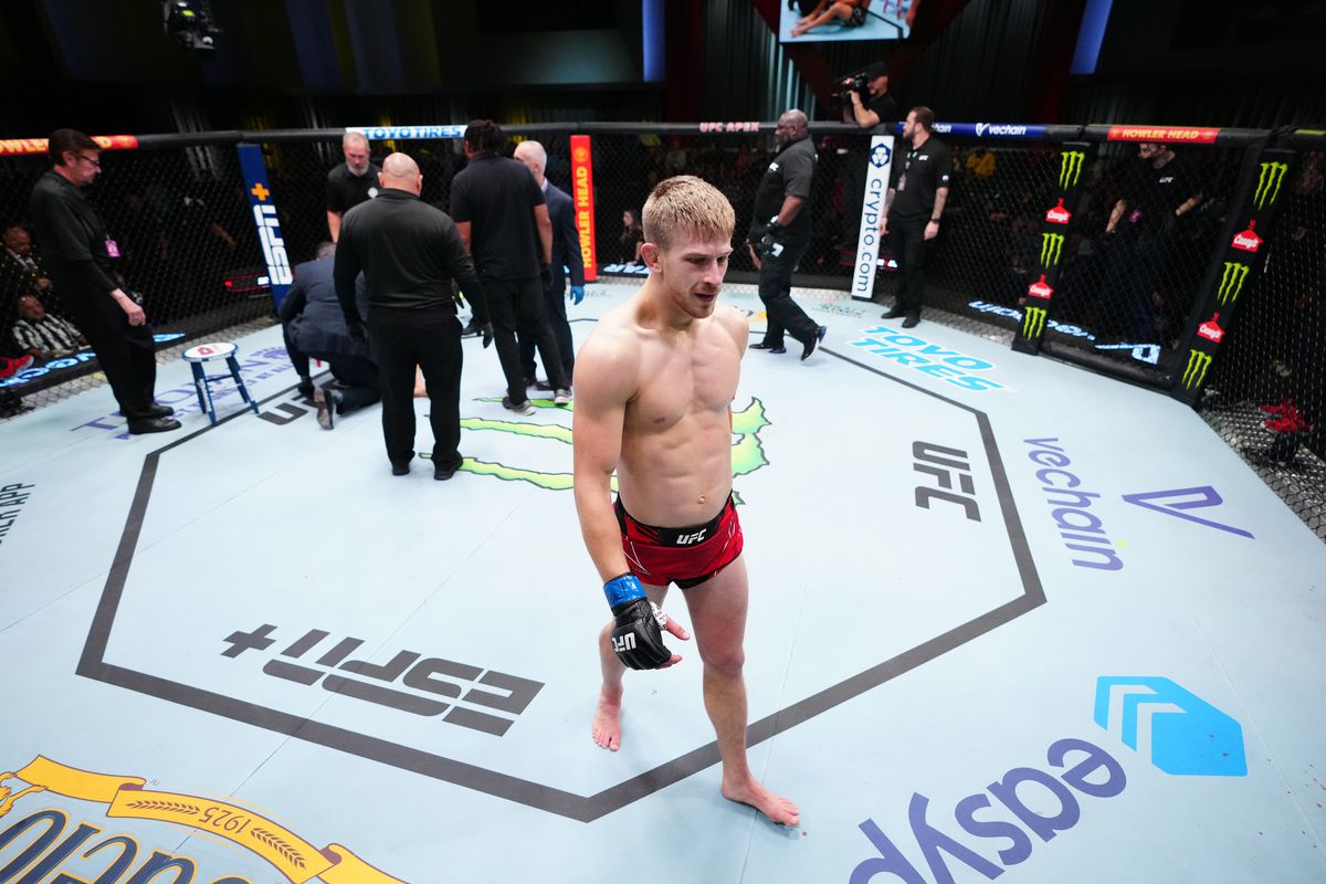 Arnold Allen following the end of his contest with Calvin Kattar after Kattar blew out his knee at UFC Vegas 63,