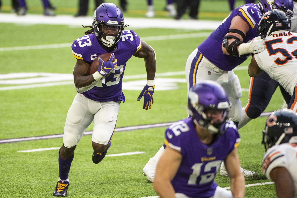 Dalvin Cook #33 of the Minnesota Vikings runs with the ball in the second quarter of the game against the Chicago Bears at U.S. Bank Stadium on December 20, 2020 in Minneapolis, Minnesota.