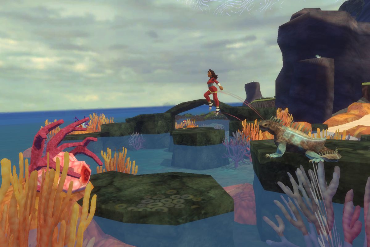 a scientist in sephonie jumping to another platform. they’re running around a rocky area by the ocean.