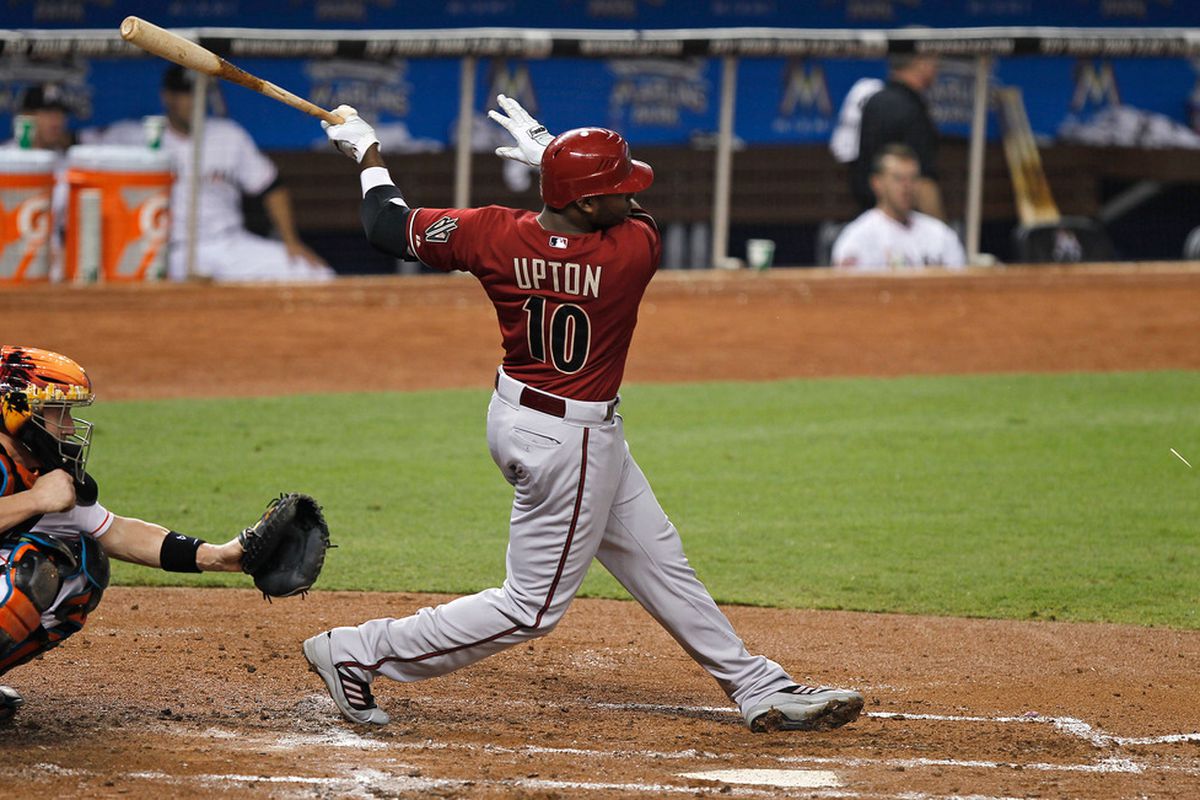 MIAMI, FL - APRIL 29: Justin Upton #10 of the Arizona Diamondbacks hits during a game against the Miami Marlins at Marlins Park on April 29, 2012 in Miami, Florida.  (Photo by Sarah Glenn/Getty Images)