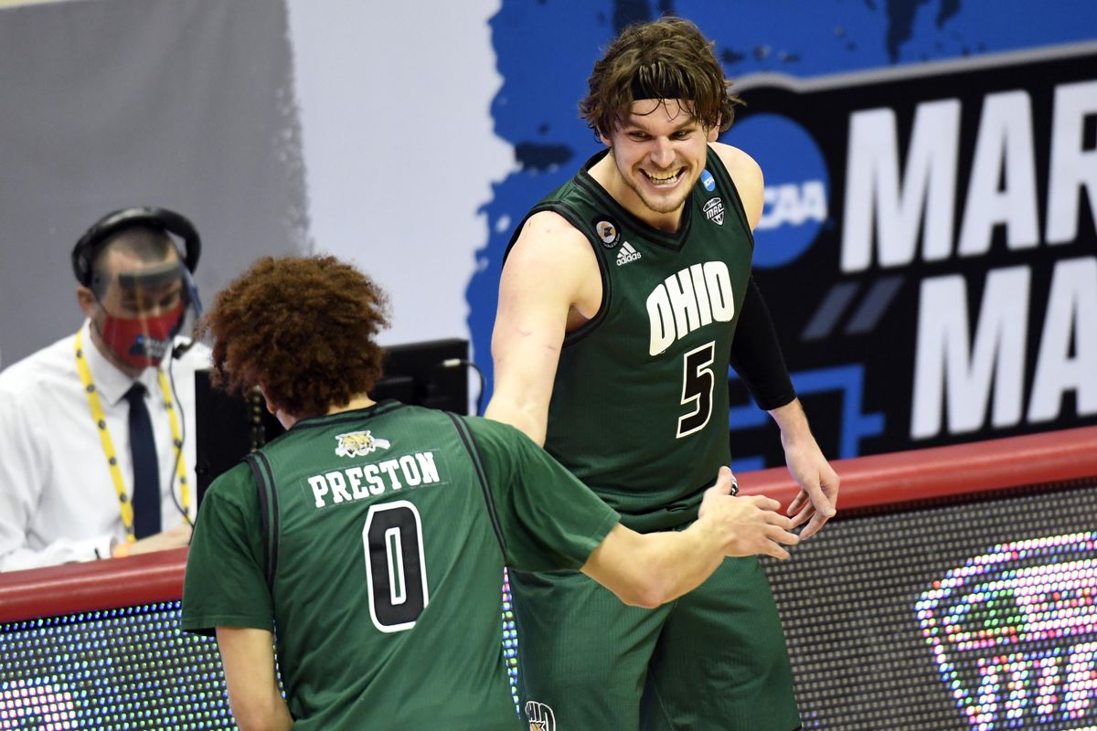 Ohio Bobcats forward Ben Vander Plas (5) and Ohio Bobcats guard Jason Preston (0) congratulate each other during the first round of the 2021 NCAA Tournament on Saturday, March 20, 2021, at Simon Skjodt Assembly Hall in Bloomington, Ind.