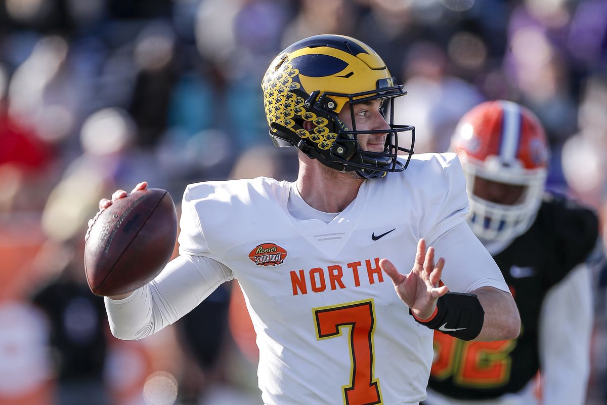 Quarterback Shea Patterson #7 from Michigan of the North Team rolls out on a pass play during the 2020 Resse’s Senior Bowl at Ladd-Peebles Stadium on January 25, 2020 in Mobile, Alabama. The North Team defeated the South Team 34 to 17.