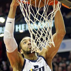 Utah Jazz center Rudy Gobert (27) dunks the ball during Game 5 of the NBA playoffs against the Houston Rockets at the Toyota Center in Houston on Tuesday, May 8, 2018. The Jazz lost 102-112.