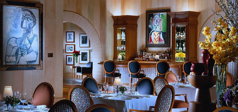 Restaurant interior with Picasso paintings on walls