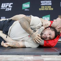 Jim Crute shows off his grappling at UFC 234 workouts.