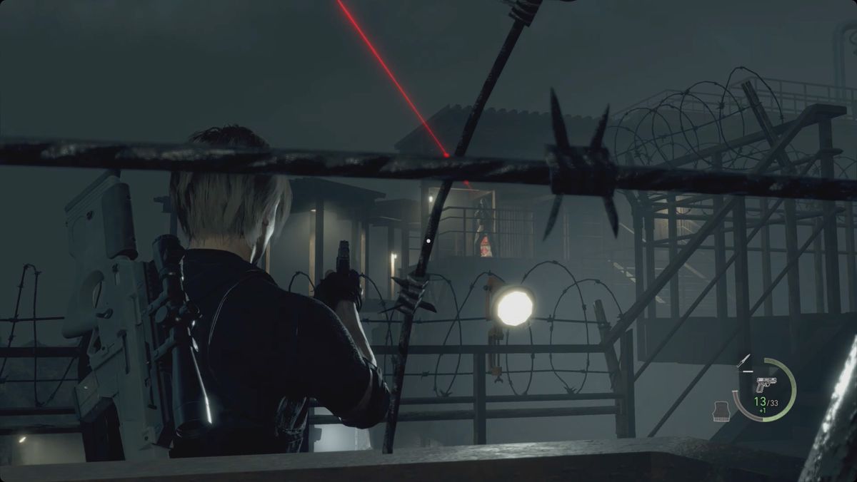 Resident Evil 4 remake Leon aiming at a rocket launcher soldier in the Stronghold