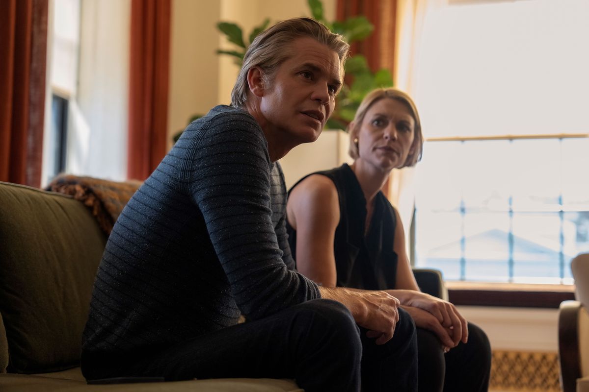 Claire Danes and Timothy Olyphant playing a married couple looking stressed on a couch