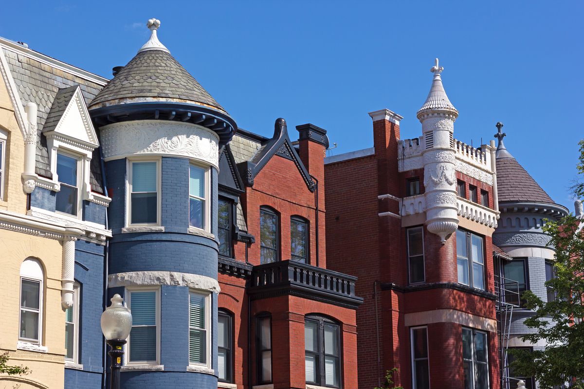 A row of townhouses in Dupont Circle, showing Victorian architecture.
