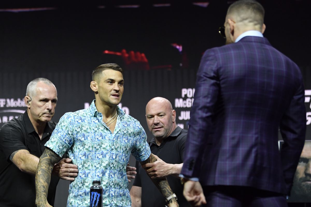 Dustin Poirier and Conor McGregor at the UFC 264 press conference in July 2021. 