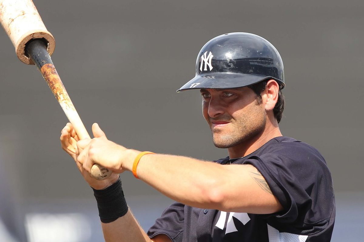 March 29, 2012; Tampa, FL, USA; New York Yankees catcher Francisco Cervelli (17) warmup prior to their game against the Baltimore Orioles at George M. Steinbrenner Field. Mandatory Credit: Kim Klement-US PRESSWIRE