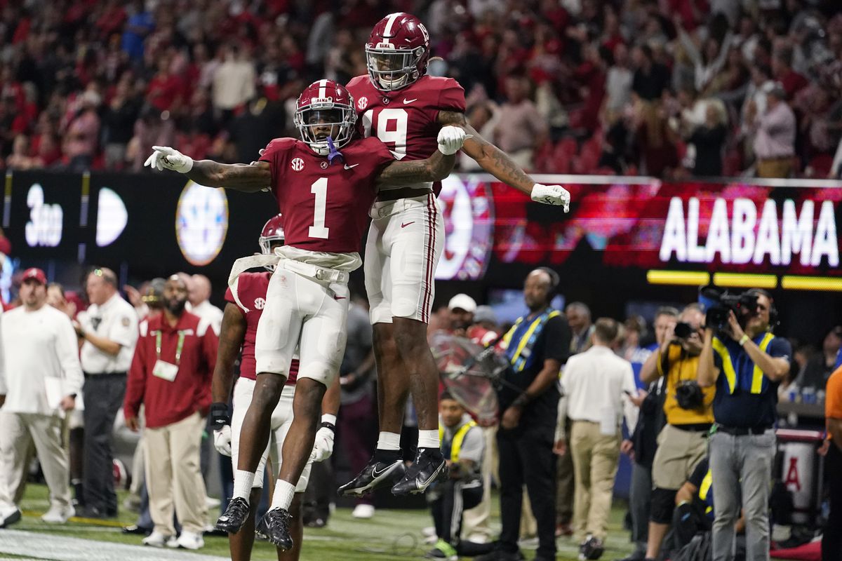 Alabama wide receiver Jameson Williams (1) celebrates his touchdown with Alabama tight end Jahleel Billingsley (19) during the second half of the Southeastern Conference championship NCAA college football game against Georgia, Saturday, Dec. 4, 2021.