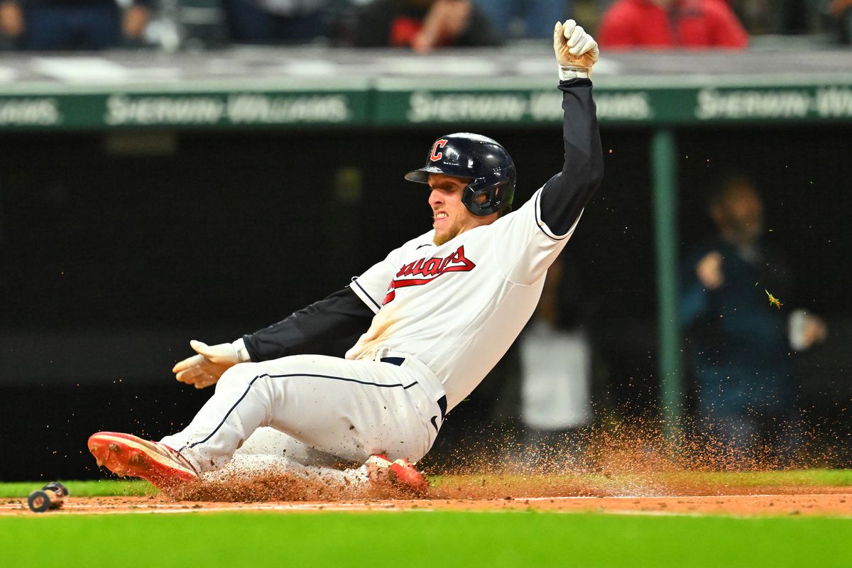 Myles Straw #7 of the Cleveland Guardians scores during the first inning of the second game of a doubleheader against the Miami Marlins at Progressive Field on April 22, 2023 in Cleveland, Ohio.