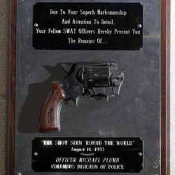 Former CPD sniper Michael Plumb used an Austrian-made Steyr SSG PII black sniper rifle to shoot this .38-caliber pistol out of the hand of a distraught man threatening suicide in the middle of a street in Dublin on August 16, 1993. Photo taken at the S.W.A.T. headquarters on Thursday, January 29, 2015. 