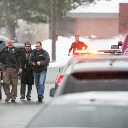 Law enforcement officers respond to a shooting at Mueller Park Junior High School in Bountiful on Thursday, Dec. 1, 2016.