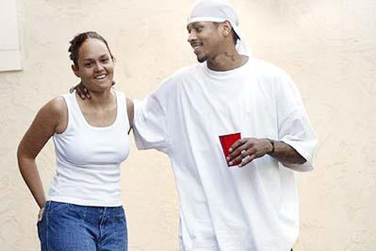 The Iverson's in happier times.  For the Iverson's happier times included oversized white t's, solo cups, and neck grabs.