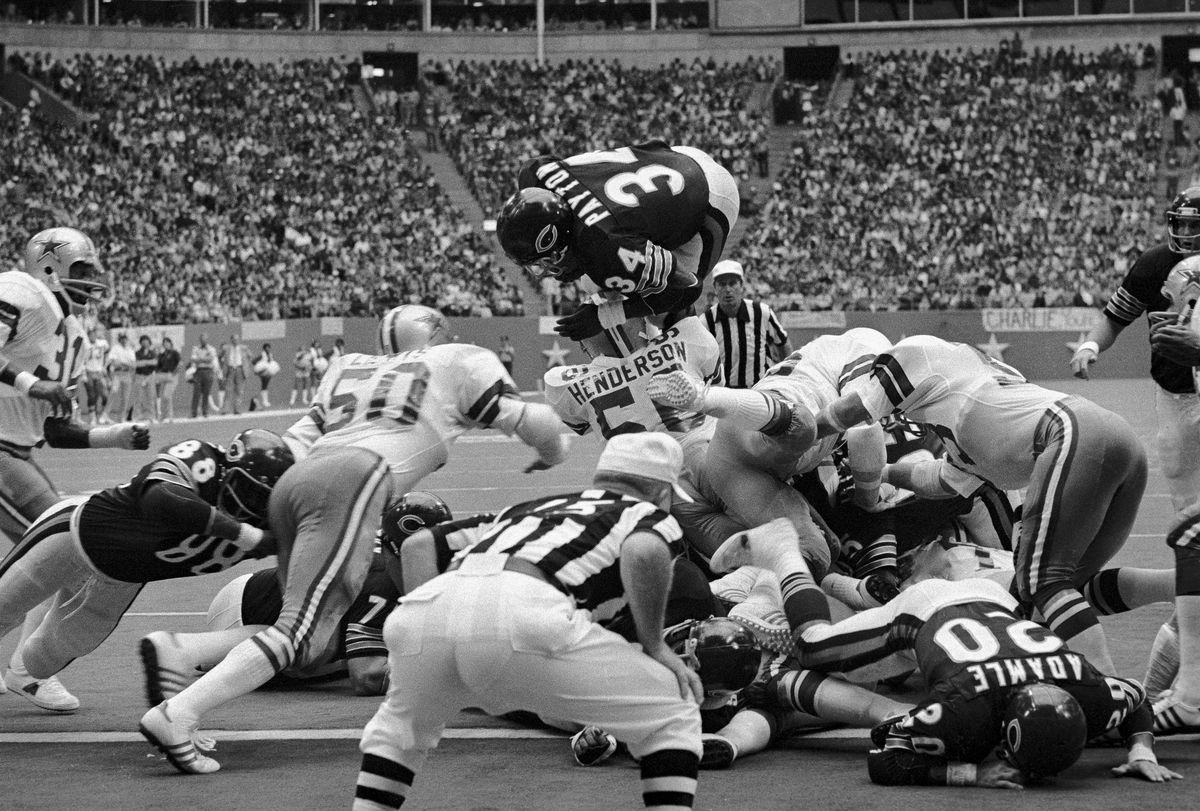 Walter Payton Leaps over Players to Score Touchdown