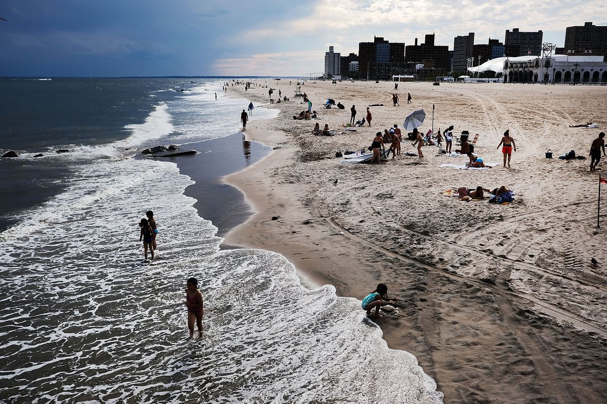 New Yorkers Welcome First Day Of Summer At Coney Island