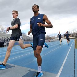 Shaquille Walker, right, works out Monday, Feb. 9, 2015, with other members of the BYU track team in Provo.