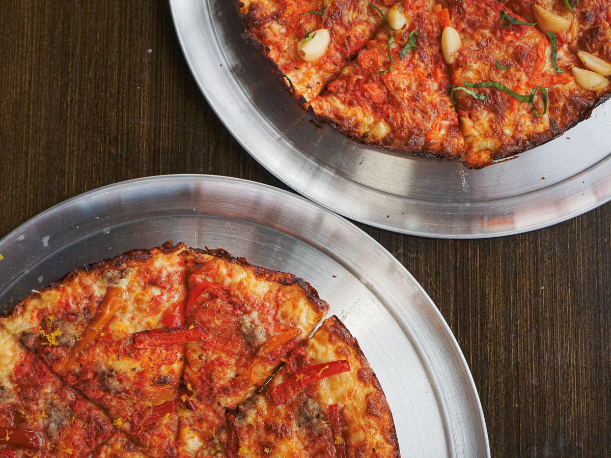 Two pans of pizza from Betelgeuse Betelgeuse.