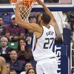 Utah center Rudy Gobert (27) scores a slam dunk during the second half of an NBA basketball game against Golden State in Salt Lake City on Thursday, Dec. 8, 2016. Golden State defeated Utah with a final score of 106-99.