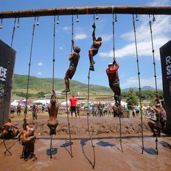 Competitors take part Saturday, June 29, 2013, in the Spartan Race at Soldier Hollow.