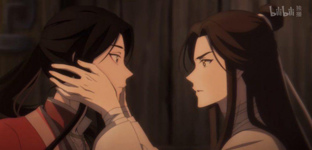 Xie Lian has his face held by a woman with long hair in Heaven Official’s Blessing 