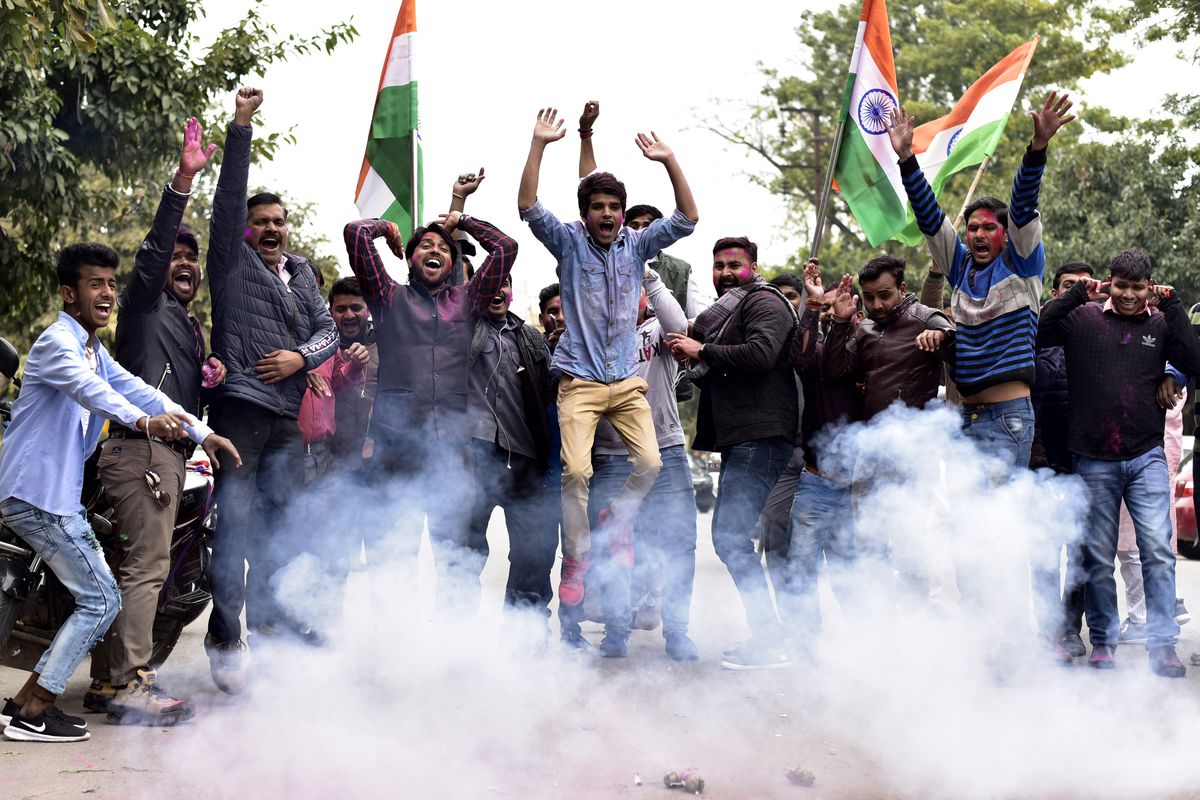 Members of an Indian political party in Noida, India, celebrating after the airstrike on Balakot on Tuesday, February 26, 2019.
