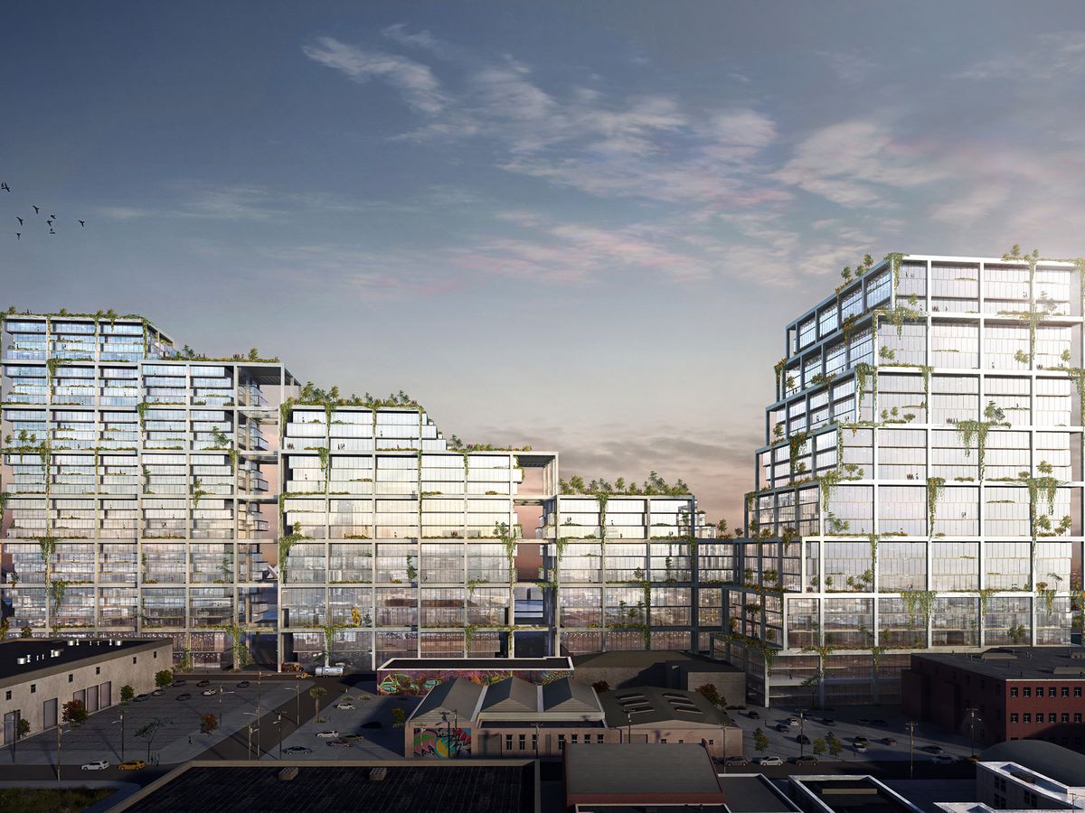 A rendering of the Mesquit project designed by Bjarke Ingels. There are a group of buildings with glass facades. A courtyard is in the center of the buildings. 