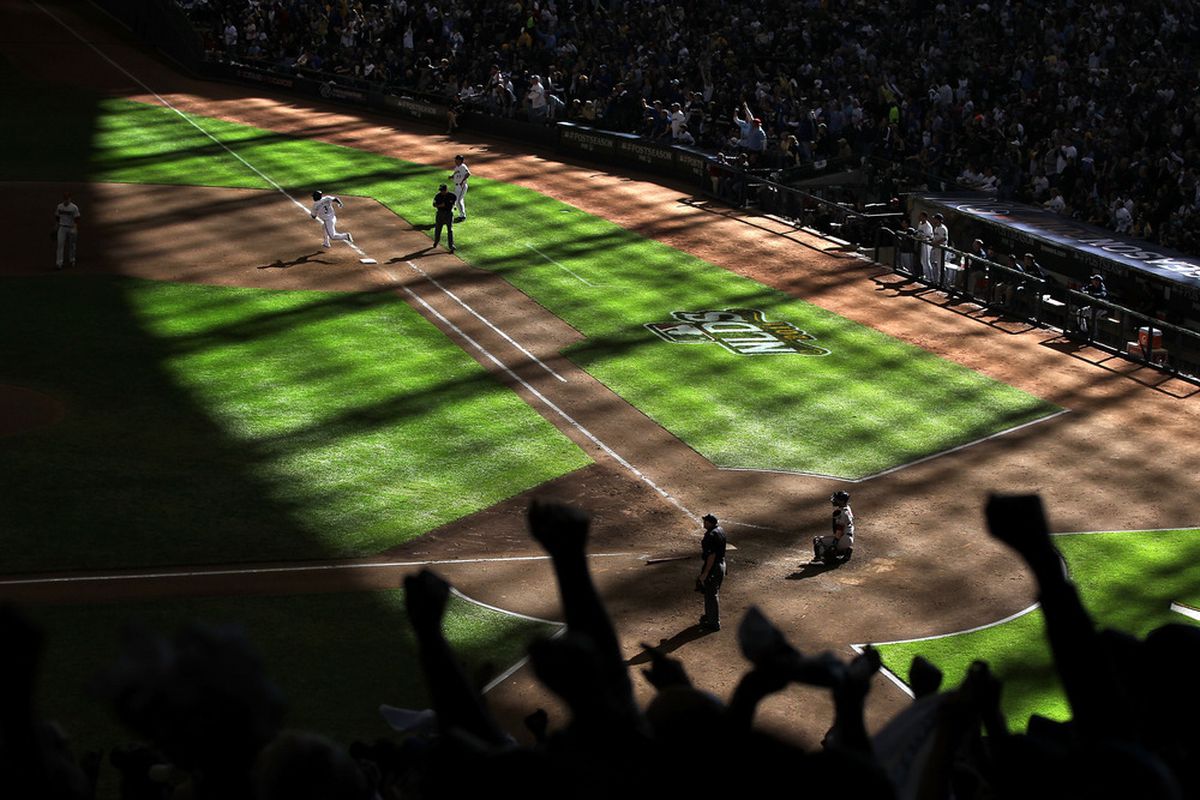 Here's a good look at the shadows from today's game, with Yuniesky Betancourt legging out a triple in the background.