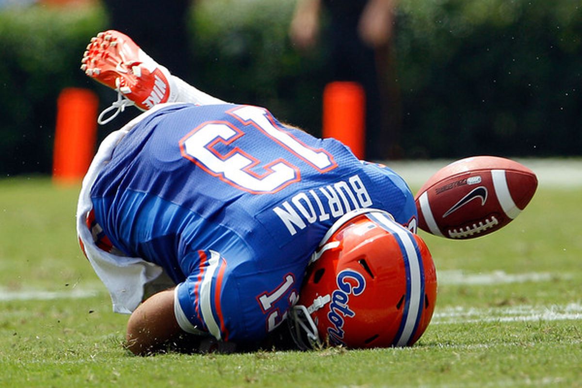GAINESVILLE FL - SEPTEMBER 04:  Trey Burton #13 of the Florida Gators attempts a reception against  the Miami University RedHawks at Ben Hill Griffin Stadium on September 4 2010 in Gainesville Florida.  (Photo by Sam Greenwood/Getty Images)