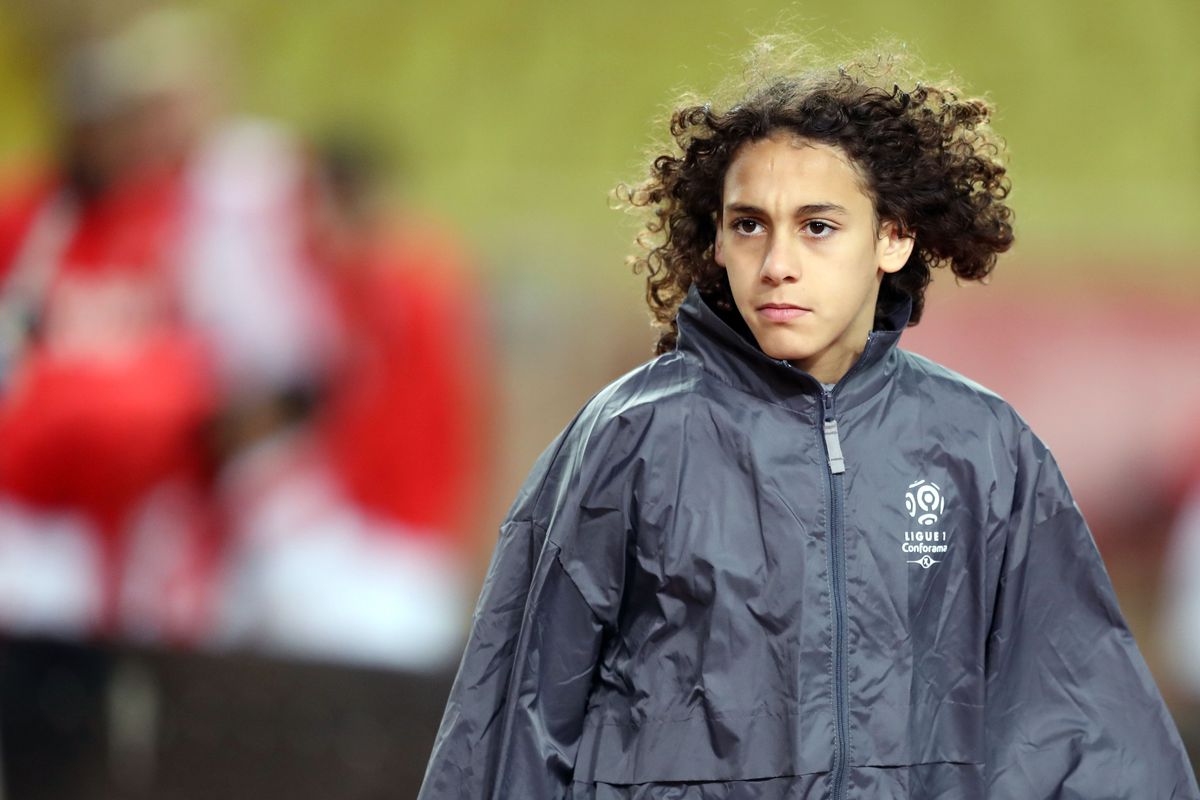 FBL-WC-2018-TALENT-FRA-BRA-YOUTH
French player Hannibal Mejbri looks on, prior to the French L1 football match between Monaco and Angers at the 'Louis II' Stadium in Monaco on December 2, 2017. The money men began sniffing around Hannibal Mejbri when he was just nine -- it was 'way too soon' complains his father, who was fielding dozens of phone calls and pitchside advances as word of his son's potential spread. Hannibal is 14 years old, and trains at the French national academy at Clairefontaine. Next season he will join the youth system at reigning French champions Monaco -- the club where Mbappe blossomed. / AFP PHOTO / VALERY HACHE 