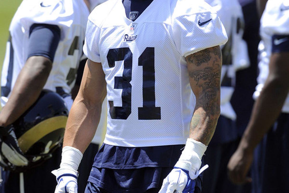 May 23, 2012; St. Louis, MO, USA; St. Louis Rams cornerback Cortland Finnegan (31) looks on during an OTA at ContinuityX Training Center. Mandatory Credit: Jeff Curry-US PRESSWIRE