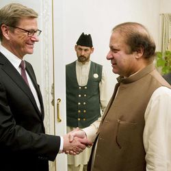 Visiting German Foreign Minister Guido Westerwelle, left, shakes hand with Pakistan's Prime Minister Nawaz Sharif prior to their meeting in Islamabad, Pakistan on Saturday, June 8, 2013. Westerwelle arrive in Islamabad on his two-day visit to Pakistan for talks with the new government on bilateral and regional matters, focusing on security issues and peace in Afghanistan. 
