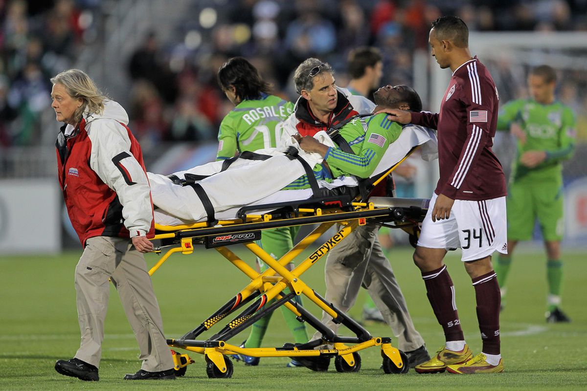 COMMERCE CITY, CO - APRIL 22:  Steve Zakuani of the Seattle Sounders FC is seen off the field after suffering a severe leg injury on a foul by Brian Mullan of the Colorado Rapids. (Photo by Doug Pensinger/Getty Images)