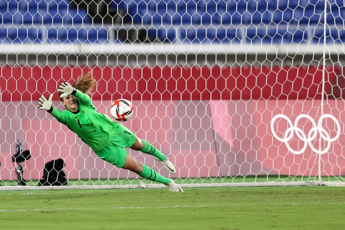 Alyssa Naeher #1 of Team United States saves the first penalty from Vivianne Miedema #9 of Team Netherlands (not pictured) during the Women’s Quarter Final match between Netherlands and United States on day seven of the Tokyo 2020 Olympic Games at International Stadium Yokohama on July 30, 2021 in Yokohama, Kanagawa, Japan.