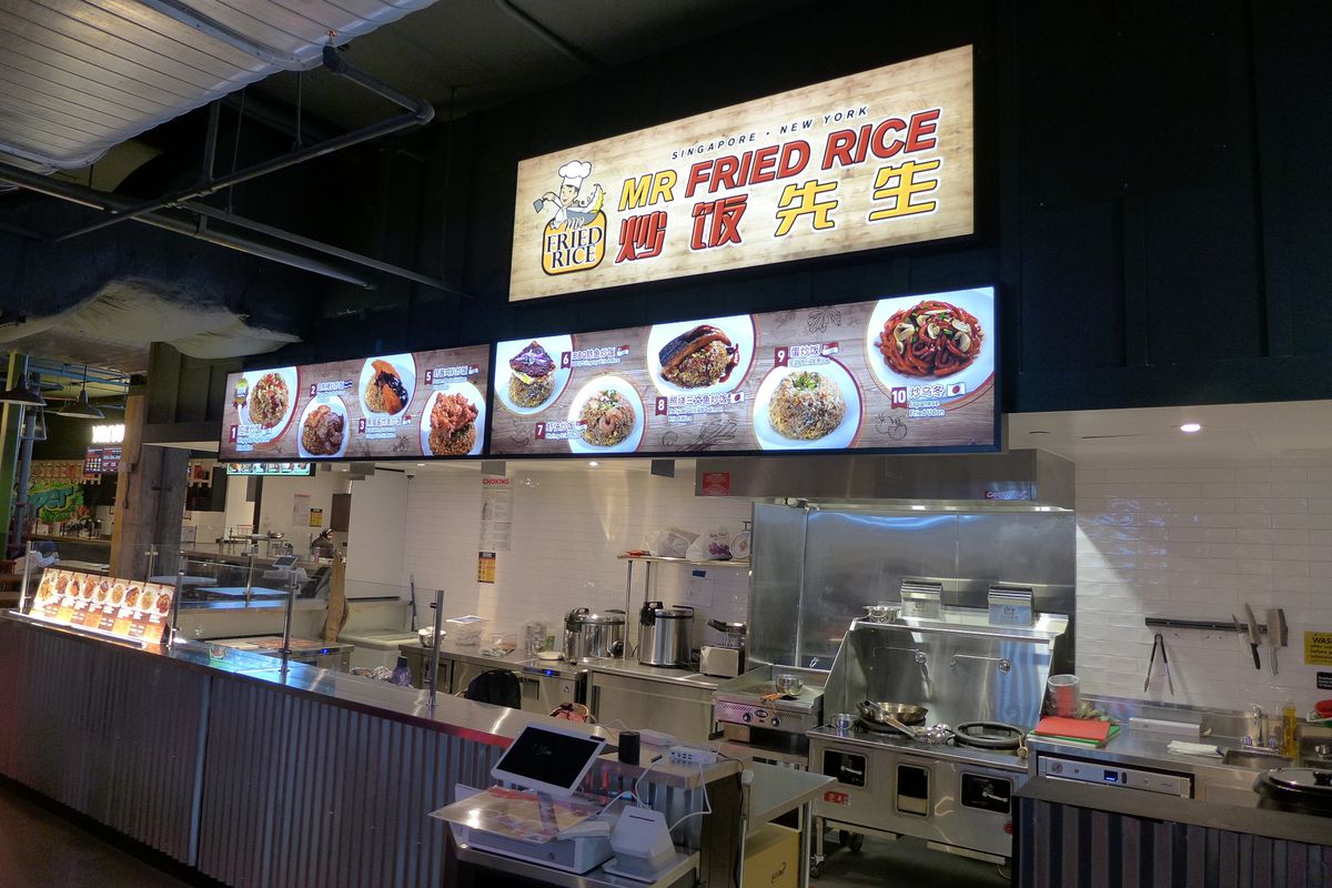 A fried rice stall at a Singaporean food hall. 
