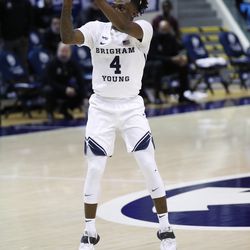 BYU guard Brandon Averette (4) puts up a shot from 3-point range during the Cougars’ 87-71 victory over Texas Southern at the Marriott Center in Provo on Monday, Dec. 21, 2020.