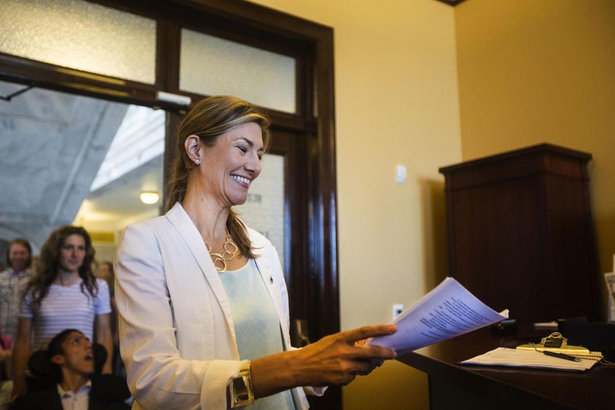 Christine Stenquist smiles as she hands over 2018 medical cannabis initiative filing to the Utah Lieutenant Governor’s Office in the state Capitol in Salt Lake City on Monday, June 26, 2017. The application will be accepted or rejected within the next thr